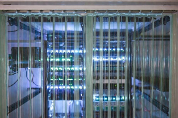 Anti-static clear strip curtains enclosing data center server racks